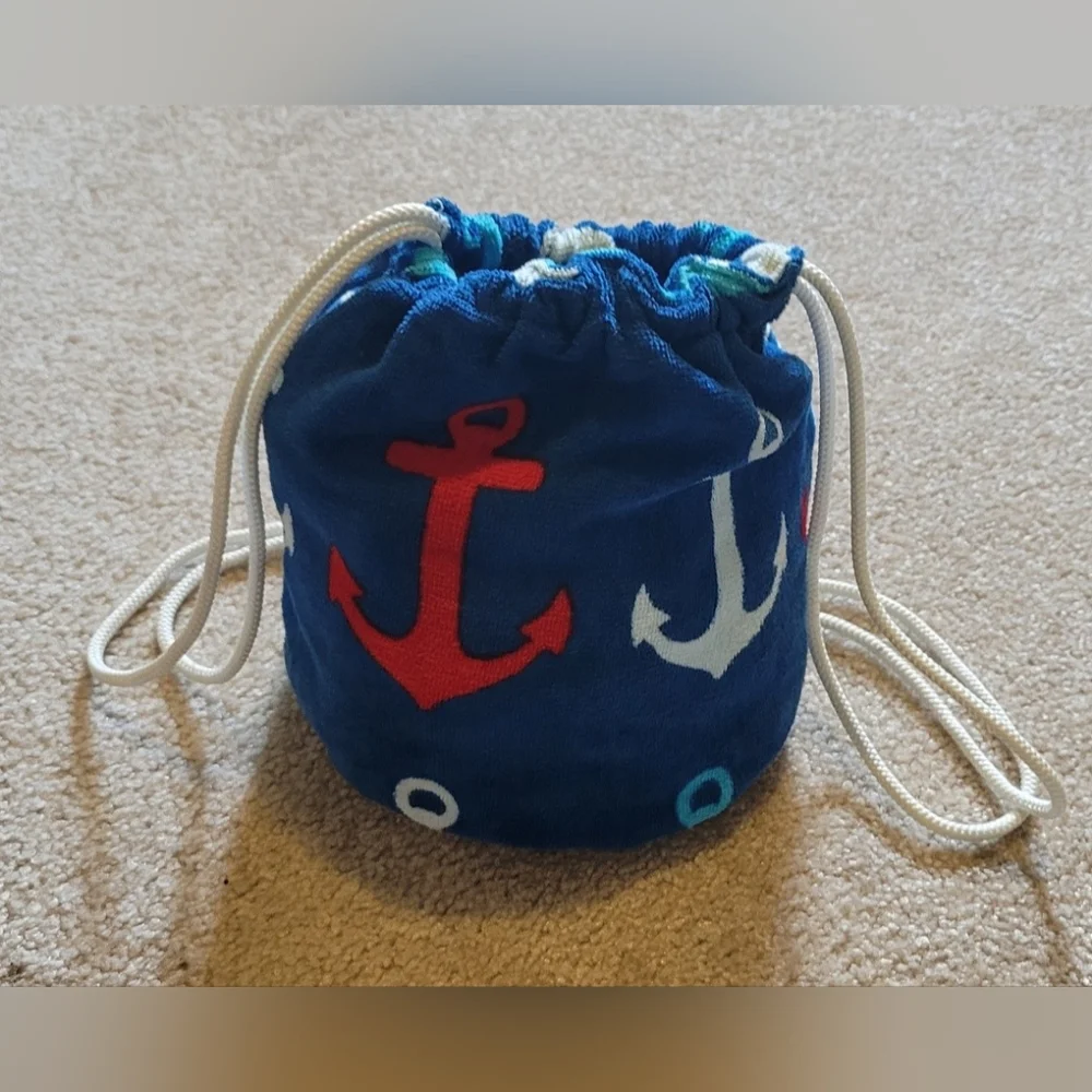 Blue anchor Beach Towel turns into bag. used